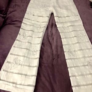 LAFEI STAR  VINTAGE mesh infused high rise jeans. Appliqués w bling throughout.